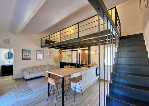 Comfort Loft, Garden View | Living area | 110-cm LED TV with cable channels