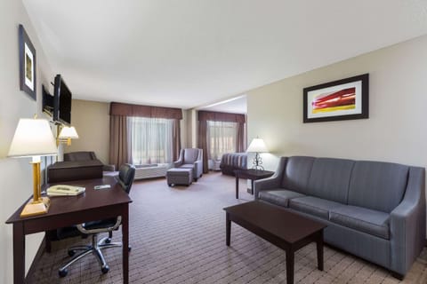 Suite, 1 King Bed | In-room safe, desk, iron/ironing board, free cribs/infant beds