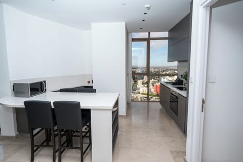 Luxury Apartment, City View | Private kitchen | Espresso maker