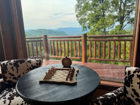 Chess table near fireplace in Family Room