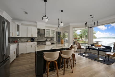 Gather around our stylish kitchen island for good food and great conversation!