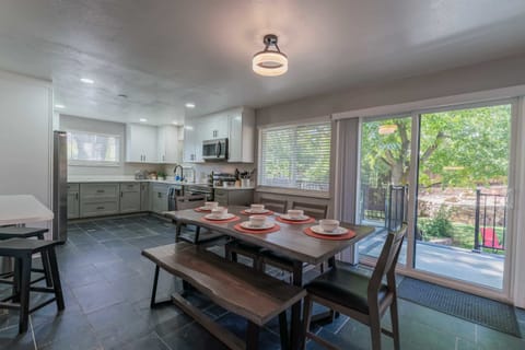 The sliding door leads to the backyard.