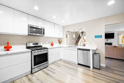 Cook up a storm in this sleek, modern kitchen perfect for your next getaway!