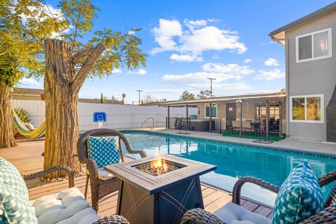 Experience the perfect blend of comfort and outdoor bliss in this 4-bedroom retreat, featuring a cozy fire pit, private pool, and hammock for ultimate relaxation.