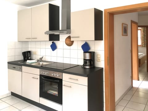 Deluxe Apartment, 3 Bedrooms | Private kitchen | Fridge, oven, dishwasher, coffee/tea maker