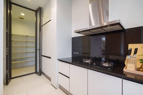 Villa | Private kitchen | Fridge, microwave, oven, stovetop