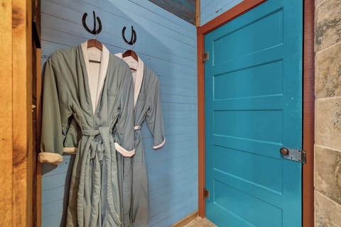 Nandina Cottage bathroom, robes are provided for your use during your stay
