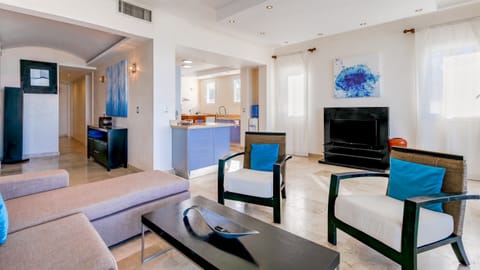 Modern kitchen and dining area in every suite—cook family meals or prep smoothies before kiting at world-famous Kite Beach Cabarete.