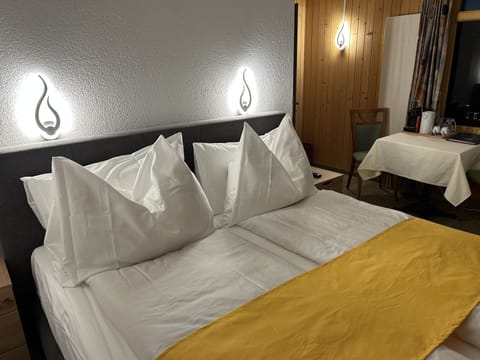 In-room safe, free WiFi, bed sheets, alarm clocks