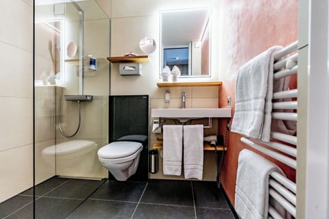Shower, eco-friendly toiletries, hair dryer, bathrobes