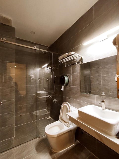 Economy Triple Room, City View | Bathroom | Shower, free toiletries, towels, soap