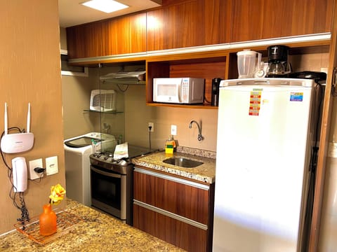 Apartment | Private kitchen | Full-size fridge, microwave, coffee/tea maker, cookware/dishes/utensils