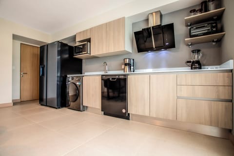 Condo, Multiple Beds, Balcony, Mountain View (Viva Jaco Viva Jaco 16-03B) | Private kitchen | Fridge, microwave, stovetop, dishwasher