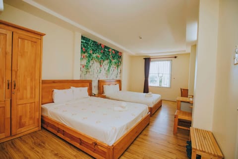 Deluxe Quadruple Room, City View | Free WiFi