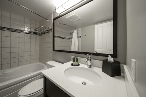 Village Suites Studio with Kitchenette | Bathroom | Free toiletries, hair dryer, towels