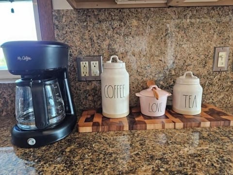 Coffee available for guests (pictured in the upstairs kitchen). 