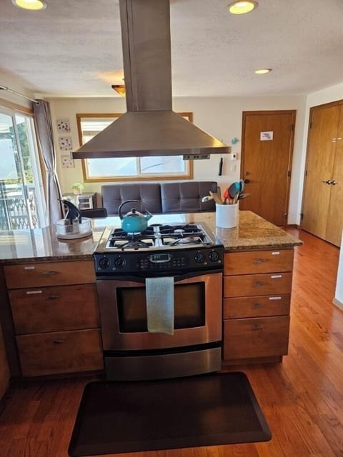 Upstairs kitchen stove/oven and sitting area