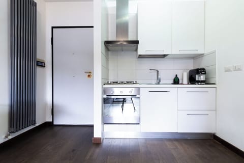Deluxe Apartment, Balcony, Courtyard View | Private kitchenette | Full-size fridge, oven, stovetop, espresso maker