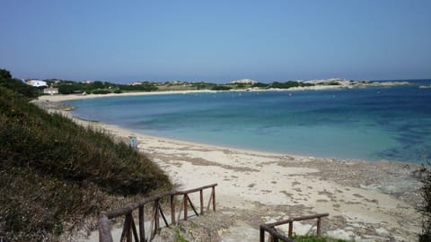 Beach nearby, white sand, sun loungers, beach umbrellas