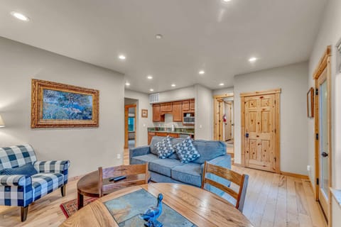 Bonus Room: 2 couches, 42” Smart TV, 4-person dining table, wet bar with microwave, mini fridge and sink, ground floor