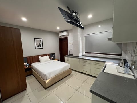 Standard Single Room, Balcony, City View | Minibar, in-room safe, laptop workspace, blackout drapes