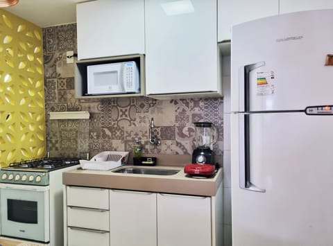 Comfort Apartment | Private kitchen | Microwave, oven, cookware/dishes/utensils