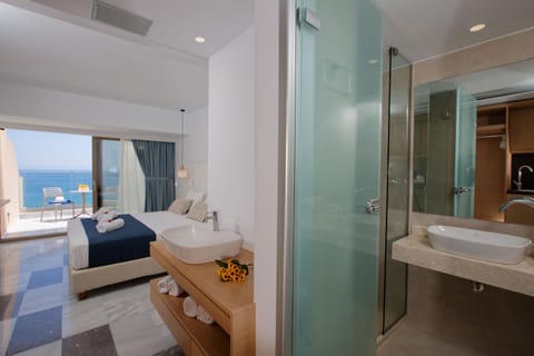 Superior Apartment, 1 Bedroom, Sea View | In-room safe, desk, laptop workspace, blackout drapes