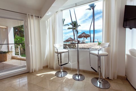 Deluxe Suite, Beachfront | In-room safe, laptop workspace, blackout drapes, iron/ironing board