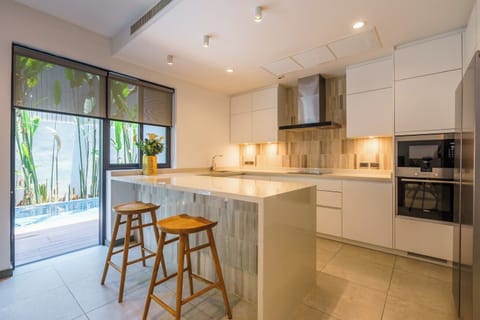 Villa | Private kitchen | Fridge, microwave, oven, stovetop