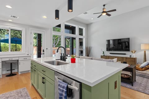 Modern kitchen with a spacious island, perfect for cooking and gatherings.