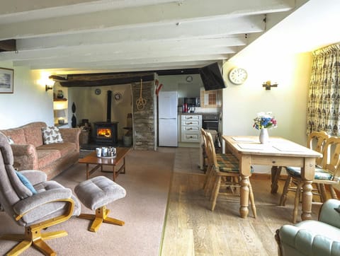 two seater sofa, lounge chair with foot rest, arm chair, coffee table. Dining table