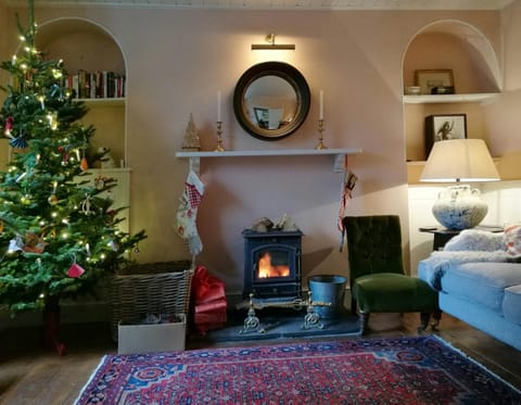 Sitting room with Christmas tree and decorations