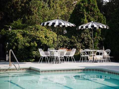 Seasonal outdoor pool, pool umbrellas, sun loungers