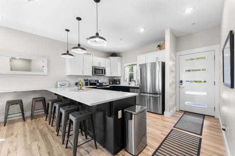 Extra barstools at the bar for every one to gather around!