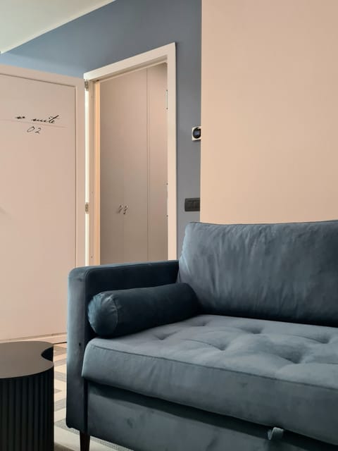 Deluxe Double Room | Living area | 42-inch TV with digital channels