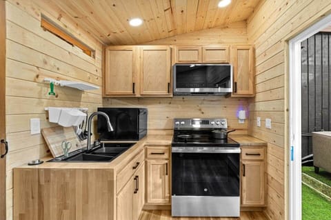 Everything you need to prepare meals: oven, stove, microwave, dishwasher, ice maker, BBQ grill and more — right inside the outdoor kitchen.