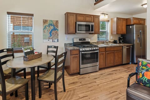 View from living room into dinning and kitchen area.