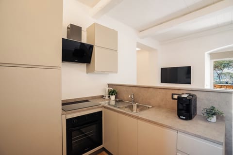 Comfort Loft, Sea View | Private kitchen | Espresso maker, coffee/tea maker, electric kettle, freezer