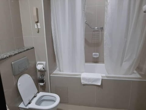 Economy Room, Balcony, City View | Bathroom | Free toiletries, hair dryer, towels, soap