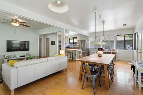 Open concept living room, dining room, and kitchen.