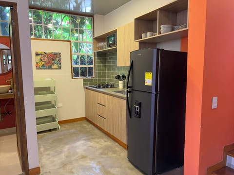 Deluxe Apartment, Patio, Garden View | Private kitchen | Coffee/tea maker