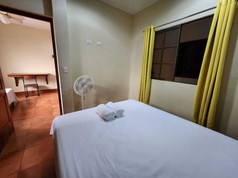 Basic Room, Non Smoking, Ground Floor | Down comforters, blackout drapes, free WiFi, bed sheets