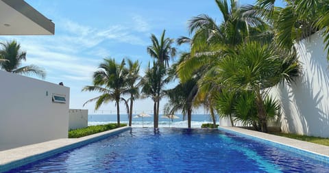 From the pool, you can see the ocean and relax—the perfect place to take some time for yourself