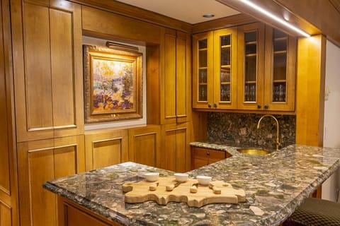 Premier Condo, 5 Bedrooms | Living area | TV, fireplace, DVD player, iPod dock