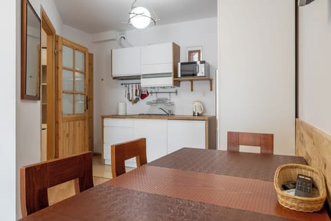 Family Apartment, 2 Bedrooms, Balcony | In-room dining