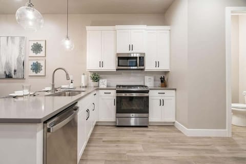 30 - Kitchen with dishwasher and new stainless steel appliances