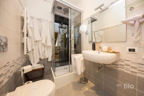 Exclusive Room, City View | Bathroom | Designer toiletries, hair dryer, slippers, bidet