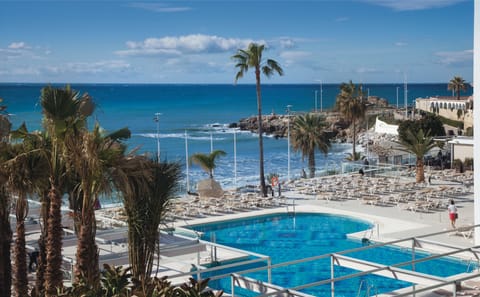 Indoor pool, outdoor pool, pool umbrellas, sun loungers