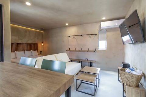 Superior Suite | Living area | 50-inch Smart TV with digital channels, streaming services