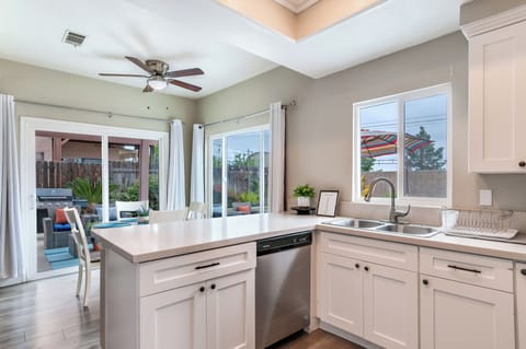 Downstairs: Kitchen with stainless steal appliances and coffee station